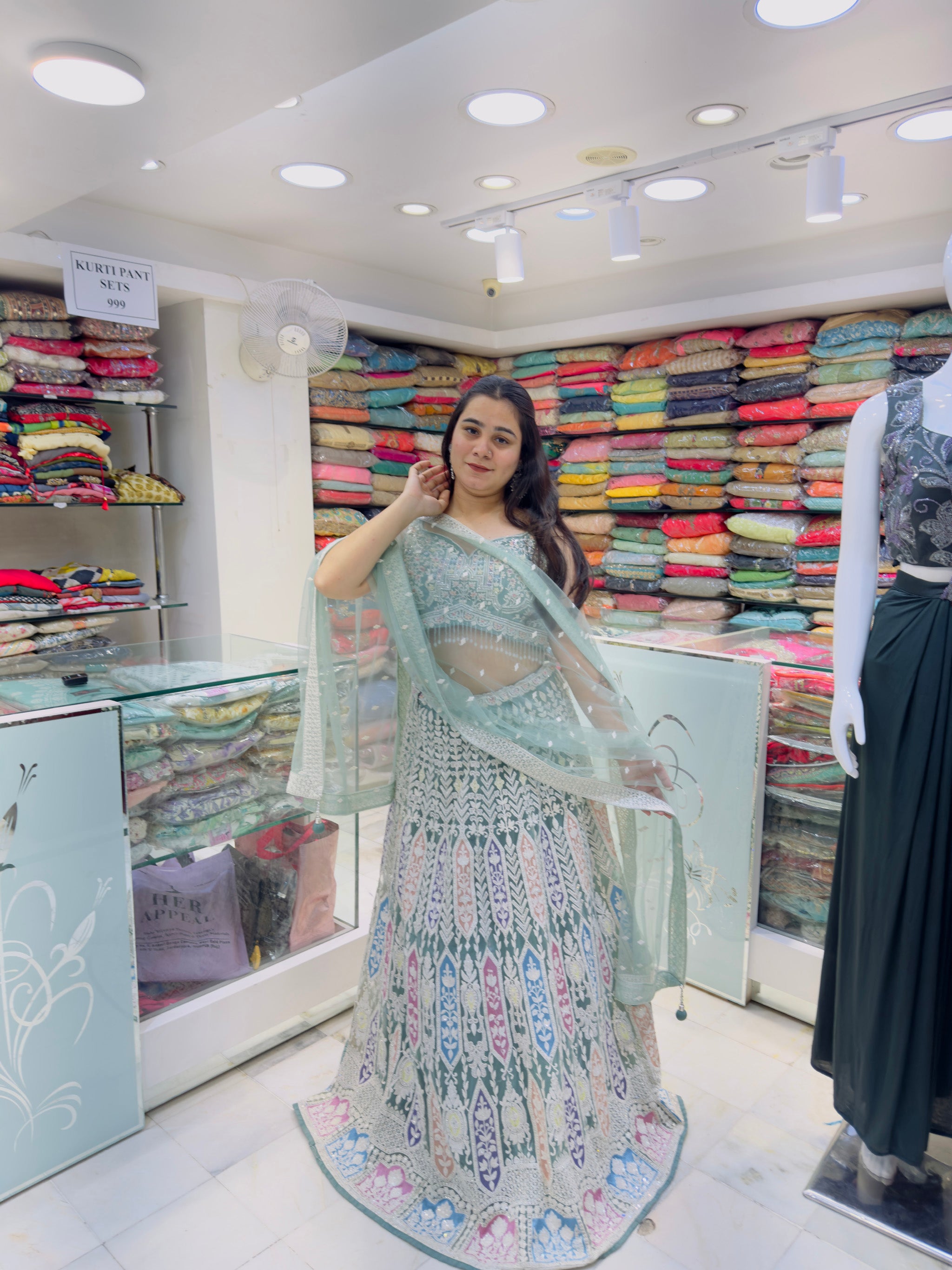 rich look embroidered multicolor engagement lehenga