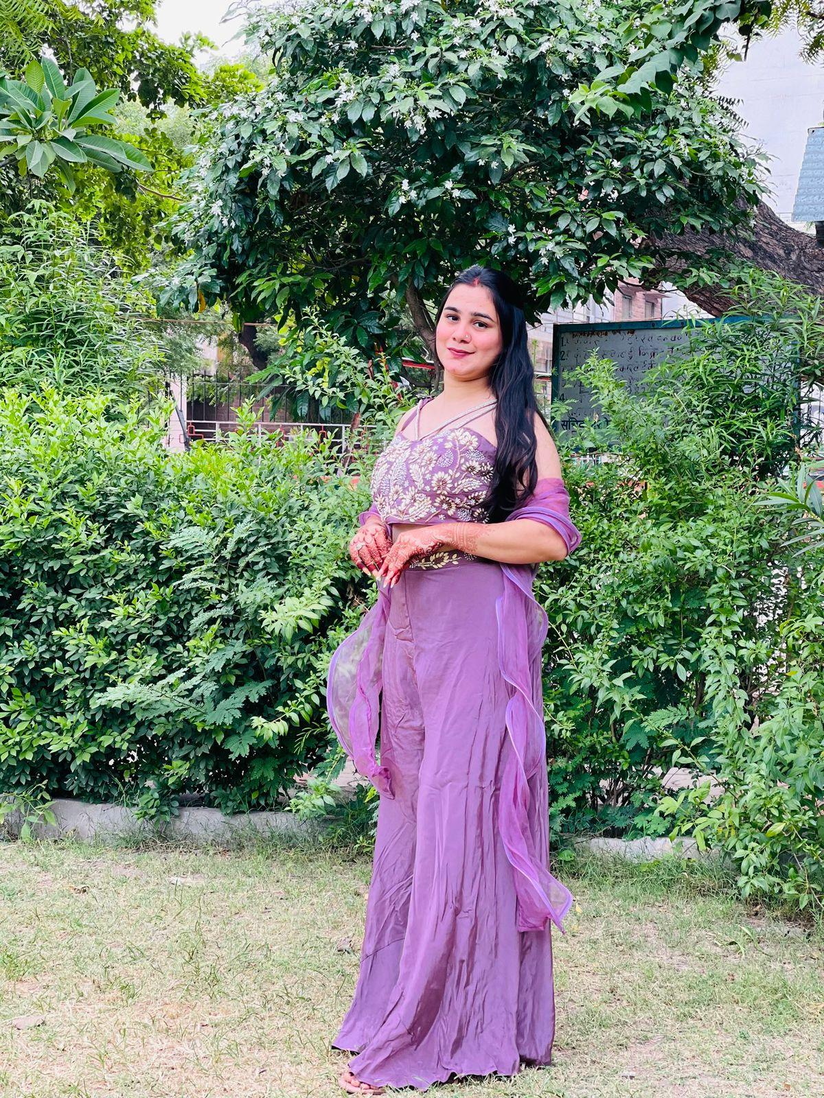 Pure crepe fabric with stylish blouse top in pearl motifs