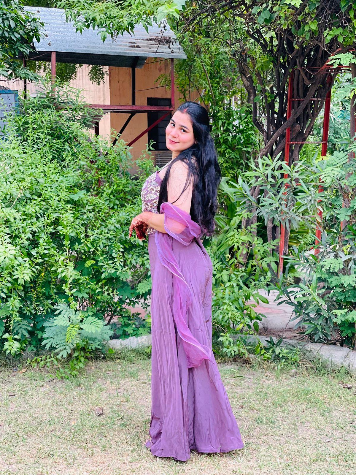 Pure crepe fabric with stylish blouse top in pearl motifs